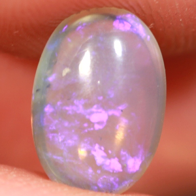 SOLID CRYSTAL OPAL Transparent with rich purple sparkles